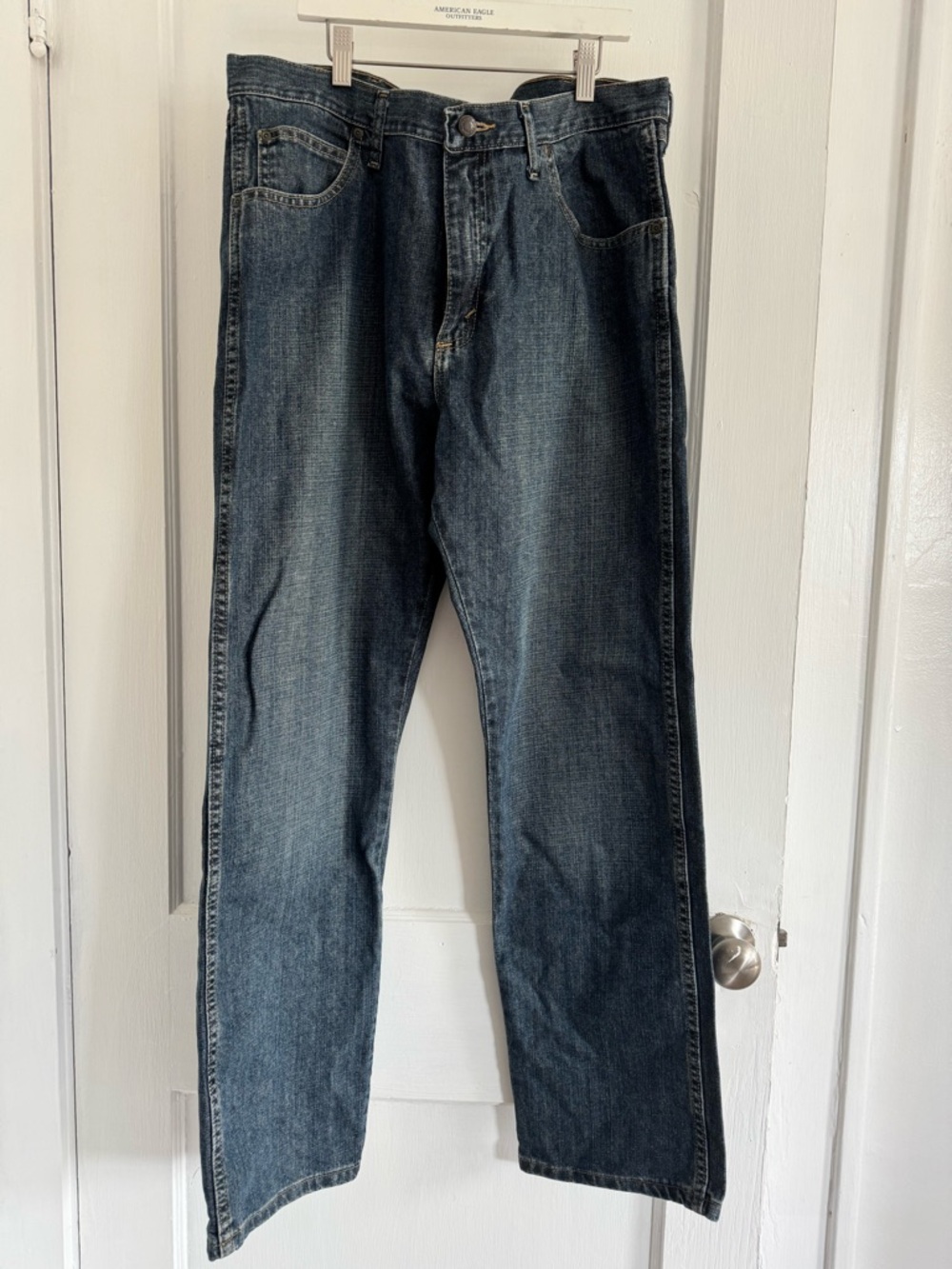 Brand New without Tags Men’s Wrangler Jeans in a dark Vintage wash.